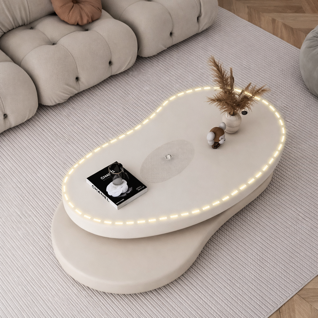 table basse salon ovale double plateaux blancs sur tapis clair plante tourne forme mangue