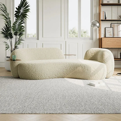 canape boucle creme courbe avec tablettes laterales