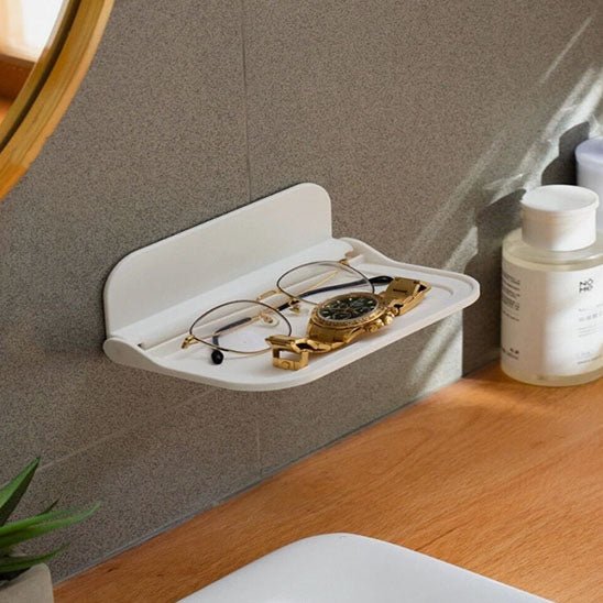 etagere murale petite blanche lunettes montre or