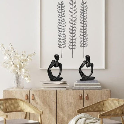 sculpture abstraite noire personnages assis decoration moderne