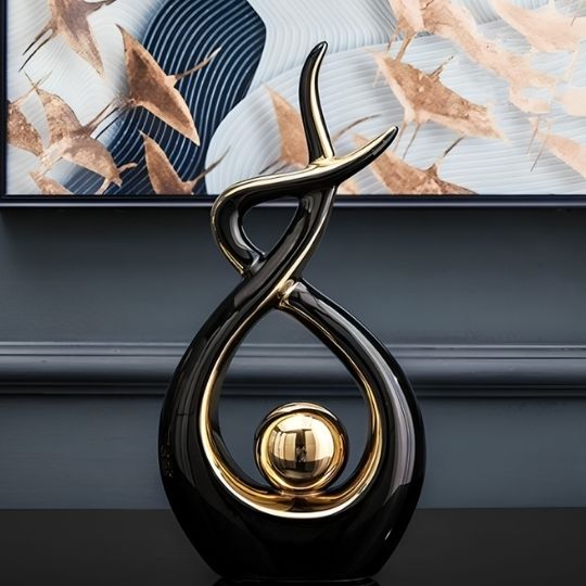 sculpture decorative ceramique noire et or
