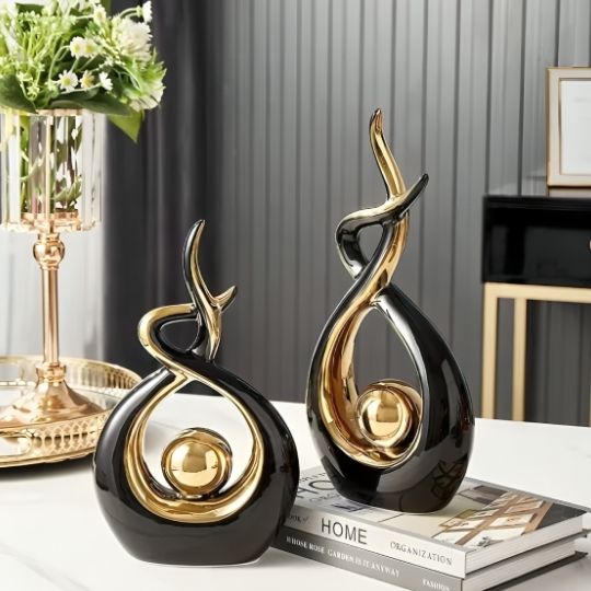 sculpture decorative ceramique noire et or
