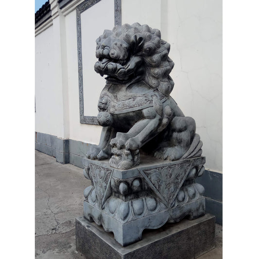 sculpture lion gardien chinois en pierre