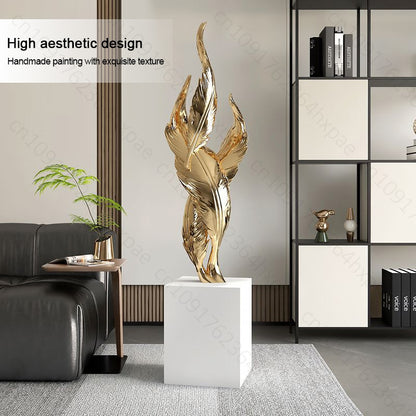 sculpture plume doree sur buffet moderne