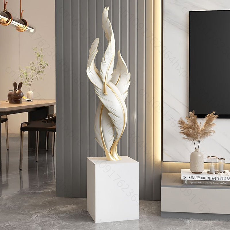 sculpture plumes blanches sur socle cubique salon moderne
