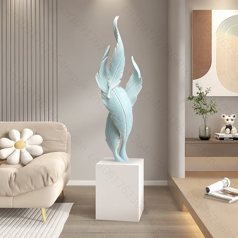 sculpture plumes turquoise sur socle blanc 