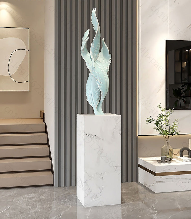 sculpture plumes turquoise sur socle marbre 