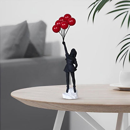 sculpture statue fillette noire ballon rouge decoration