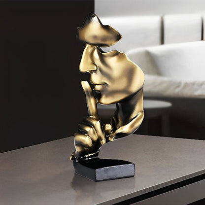 sculpture visage abstrait dore gestuelle silence