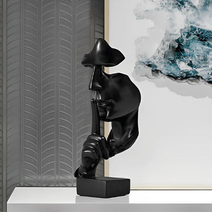 sculpture visage abstrait noir geste silence