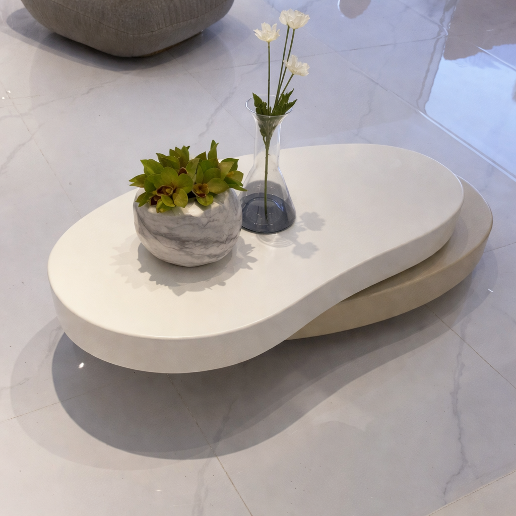 table basse salon ovale double plateaux blancs sur tapis clair plante tourne avec vase