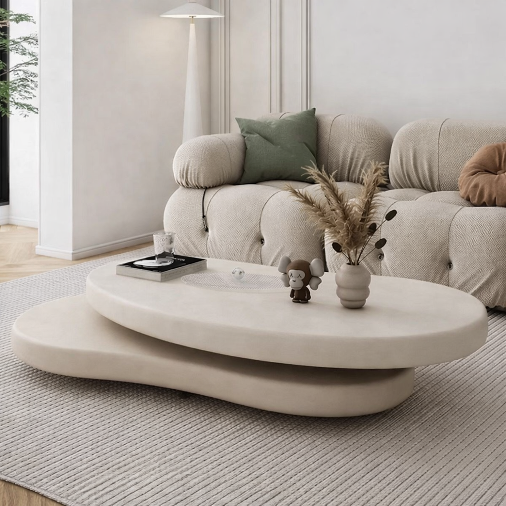 table basse salon ovale double plateaux blancs sur tapis clair plante