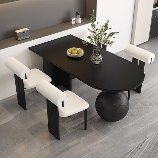 table a manger noire ovale pied boule chaises blanches